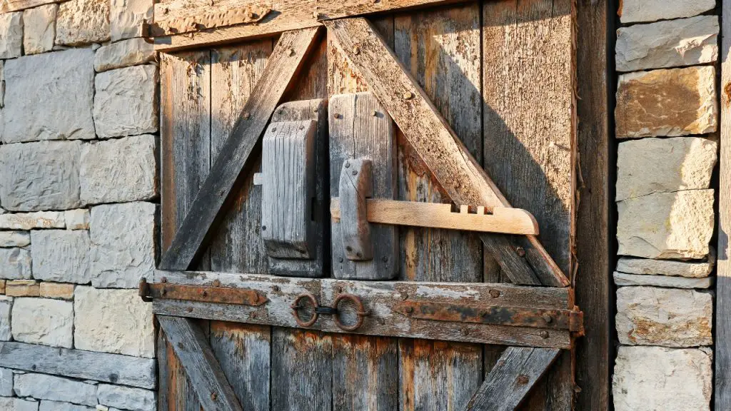 ancient greek wooden door lock on a barn door